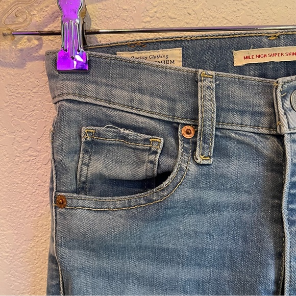 Levi’s Mile High Super Skinny Jeans with Holes and Frayed Bottoms - Picture 6 of 11